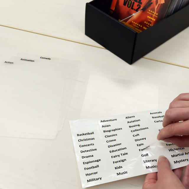 DVD verdelers met ringbandgaten incl. etiketten met voorbedrukte filmgenres