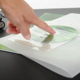 Itsekiinnittyvä CD/DVD-tasku, sormiaukolla, pysyvä